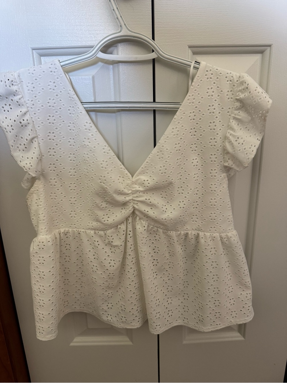 Women's White Eyelet Peplum V-Neck Top